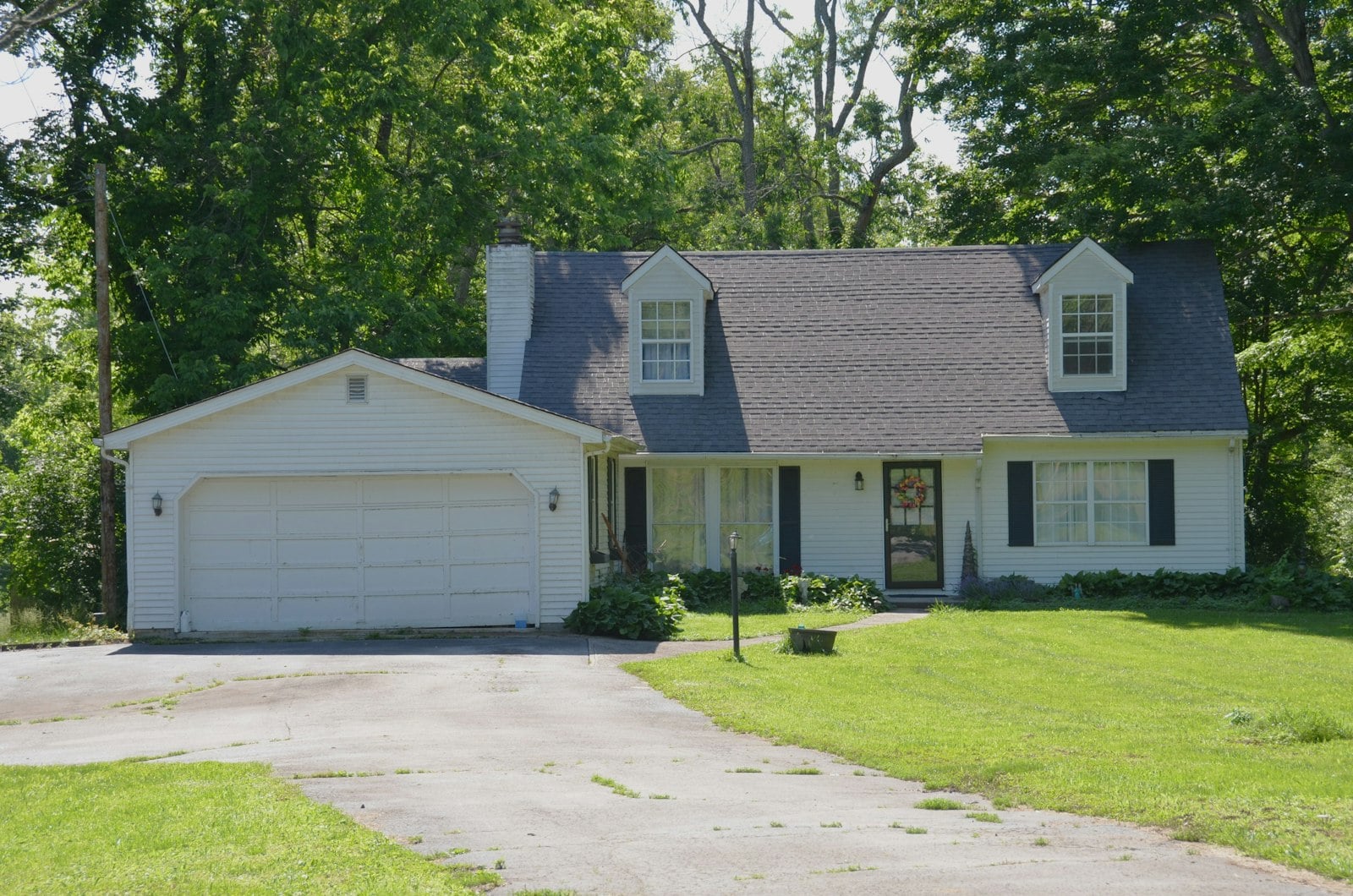 Suburban house with a white two-car garage door